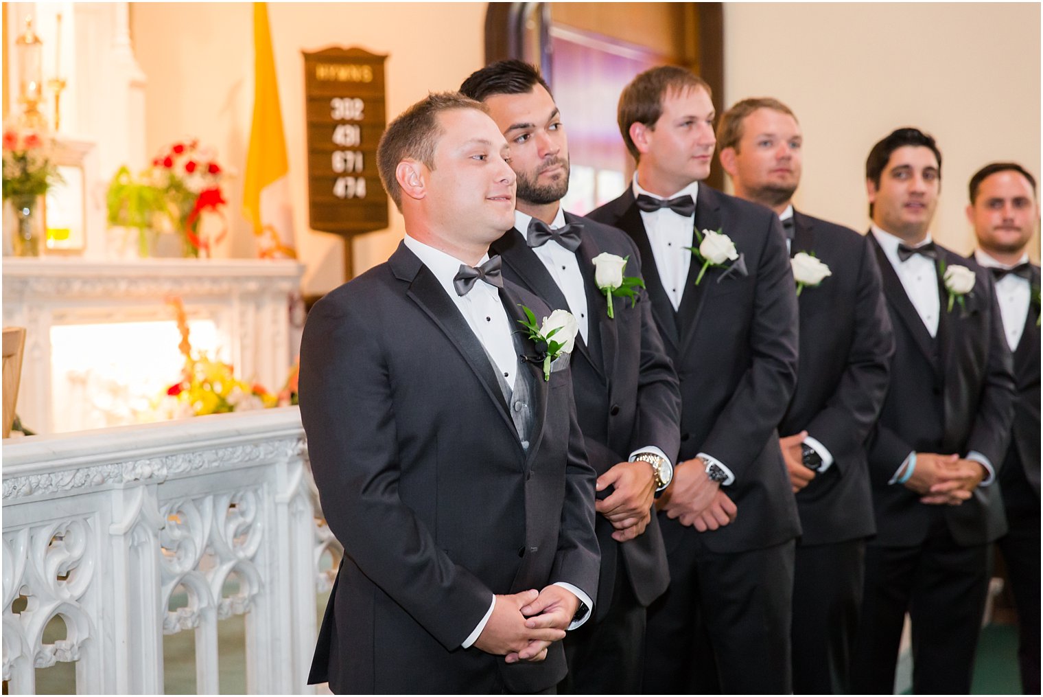 Groom at the altar