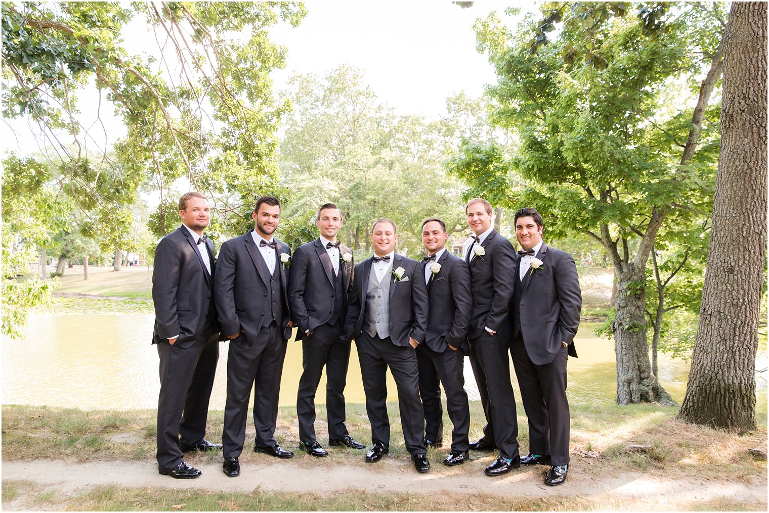 Groomsmen in black tuxedos