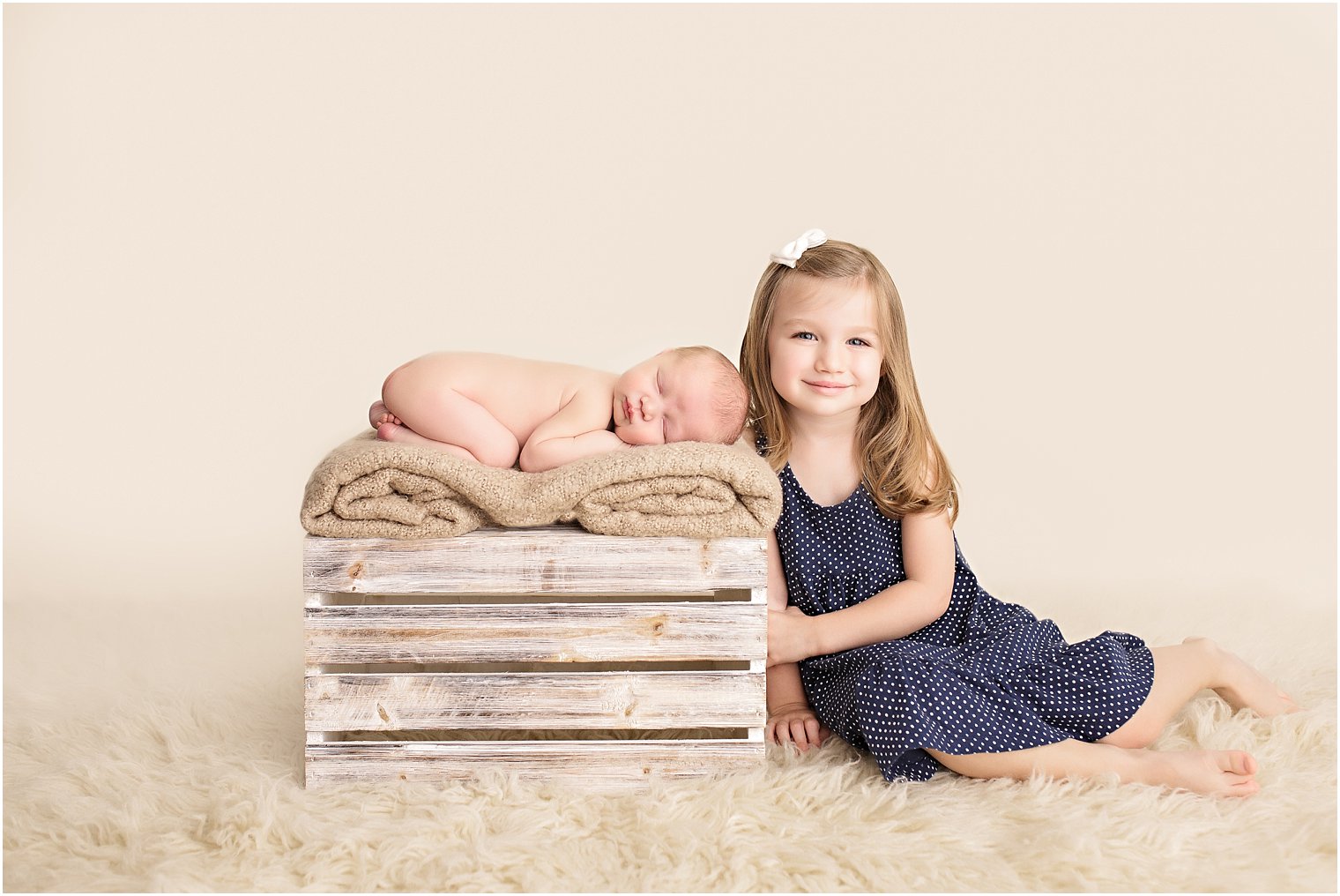 Sister and newborn photo
