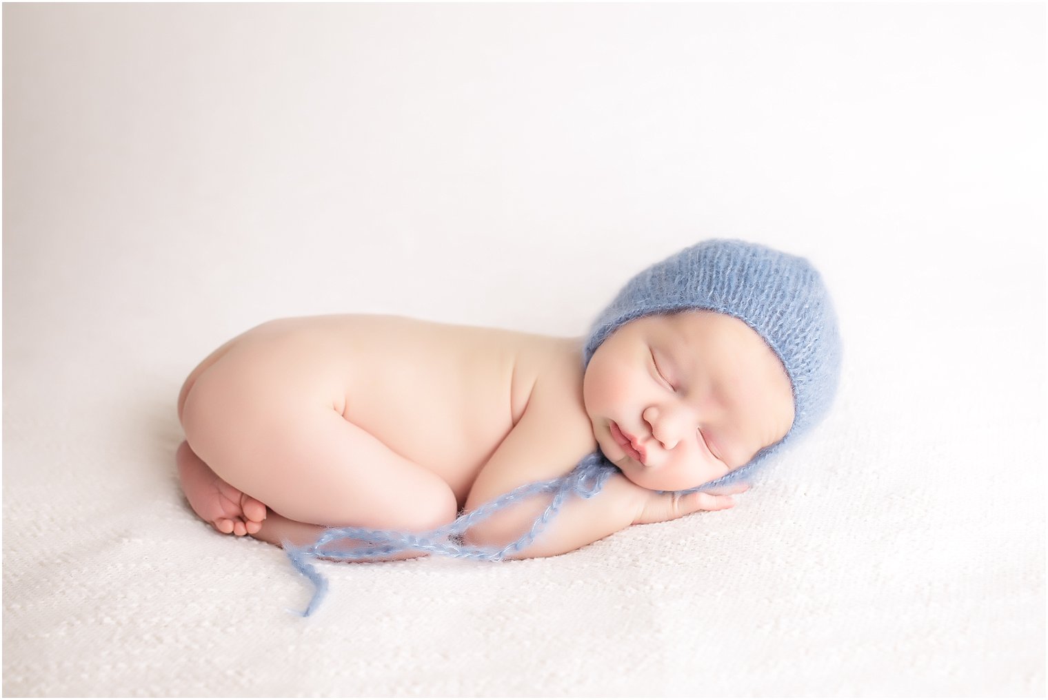 Sleeping newborn boy