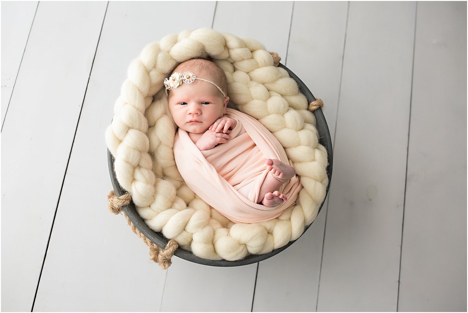 Newborn girl with eyes wide open