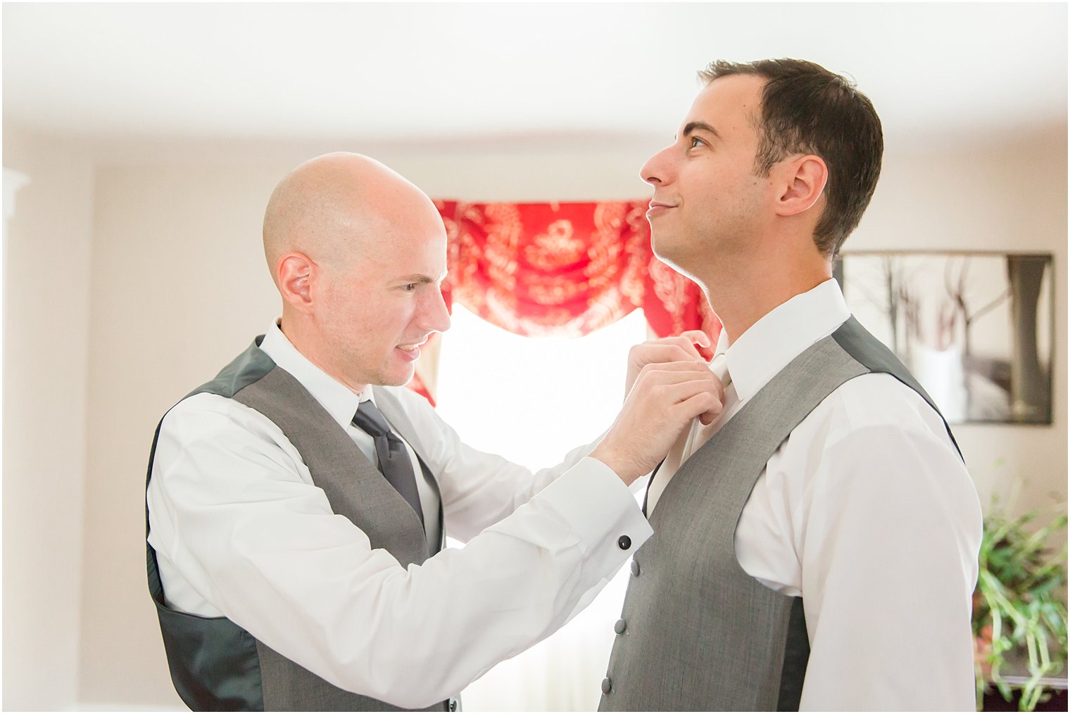 Groom and brother getting ready