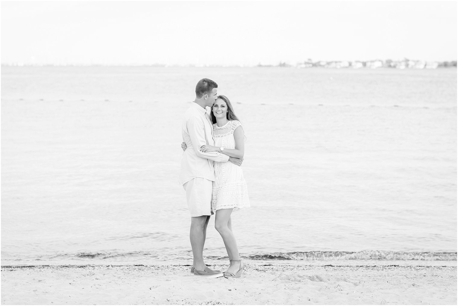 Romantic black and white photo of engaged couple