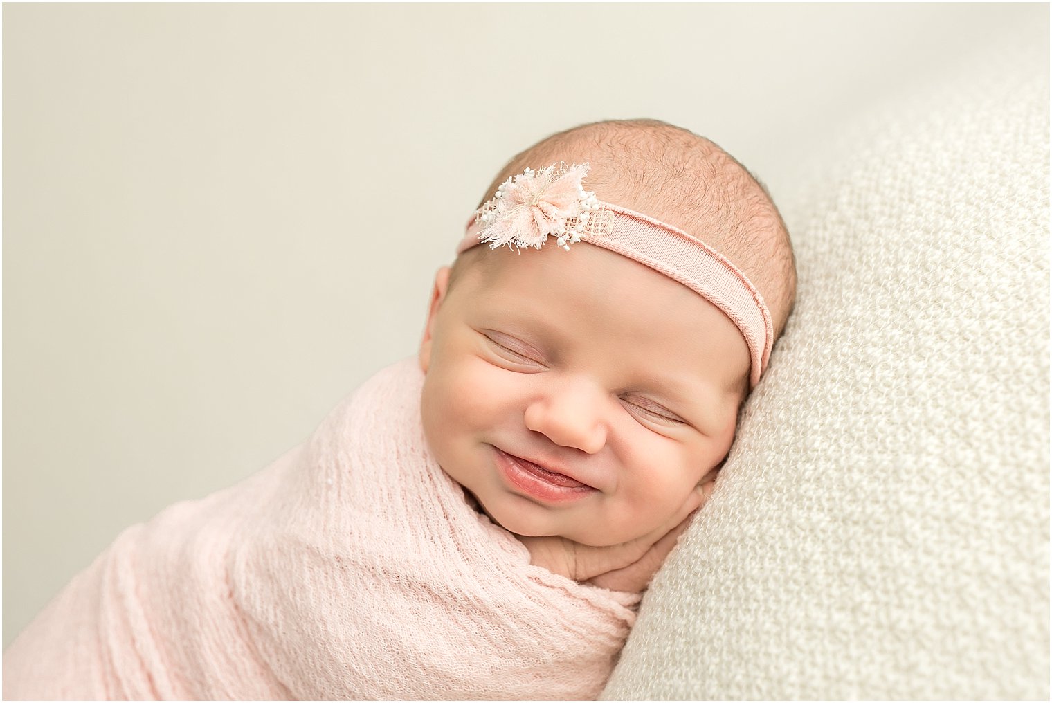 Smiling newborn photo