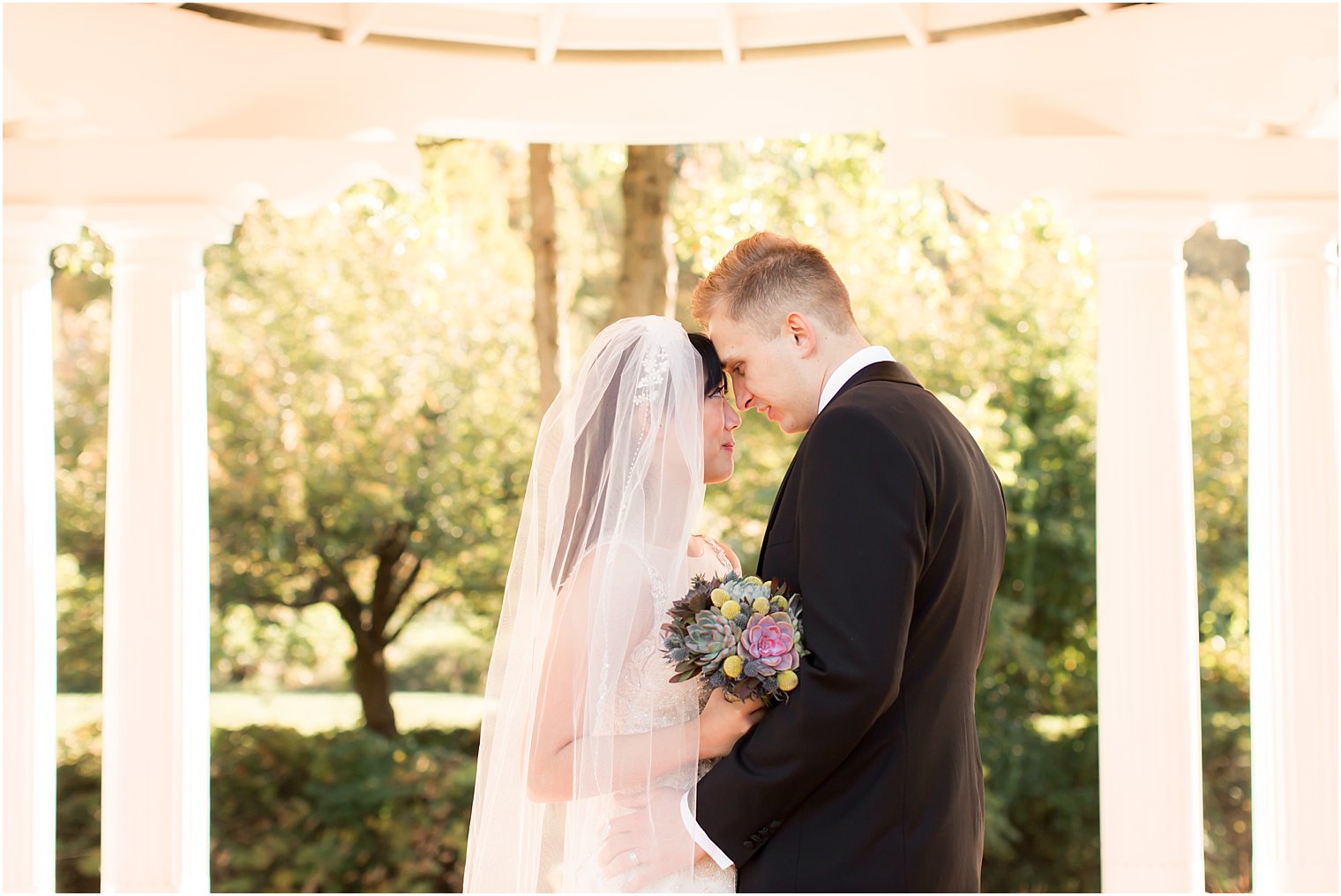 Sweet moment between bride and groom