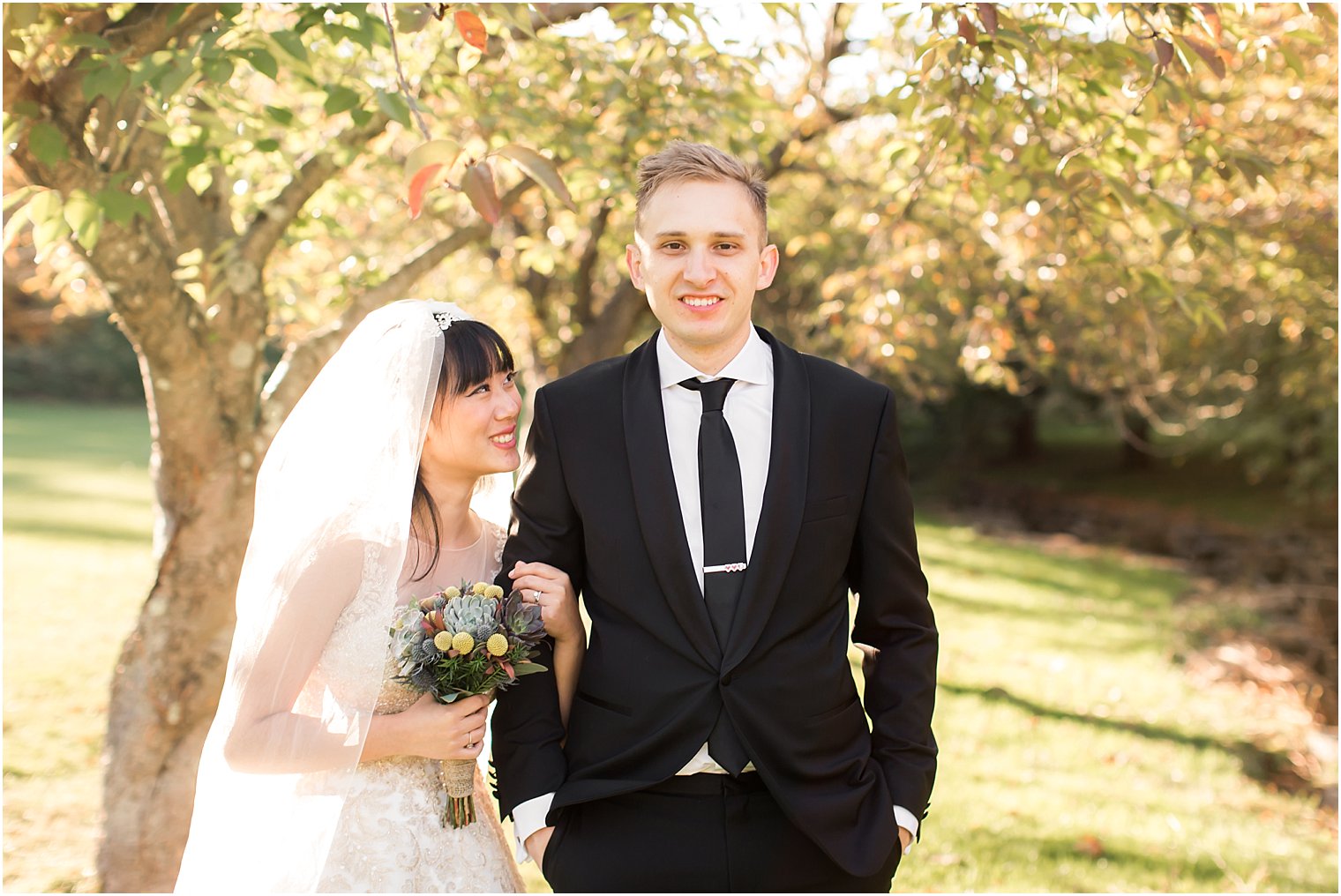 Bride and groom smiling