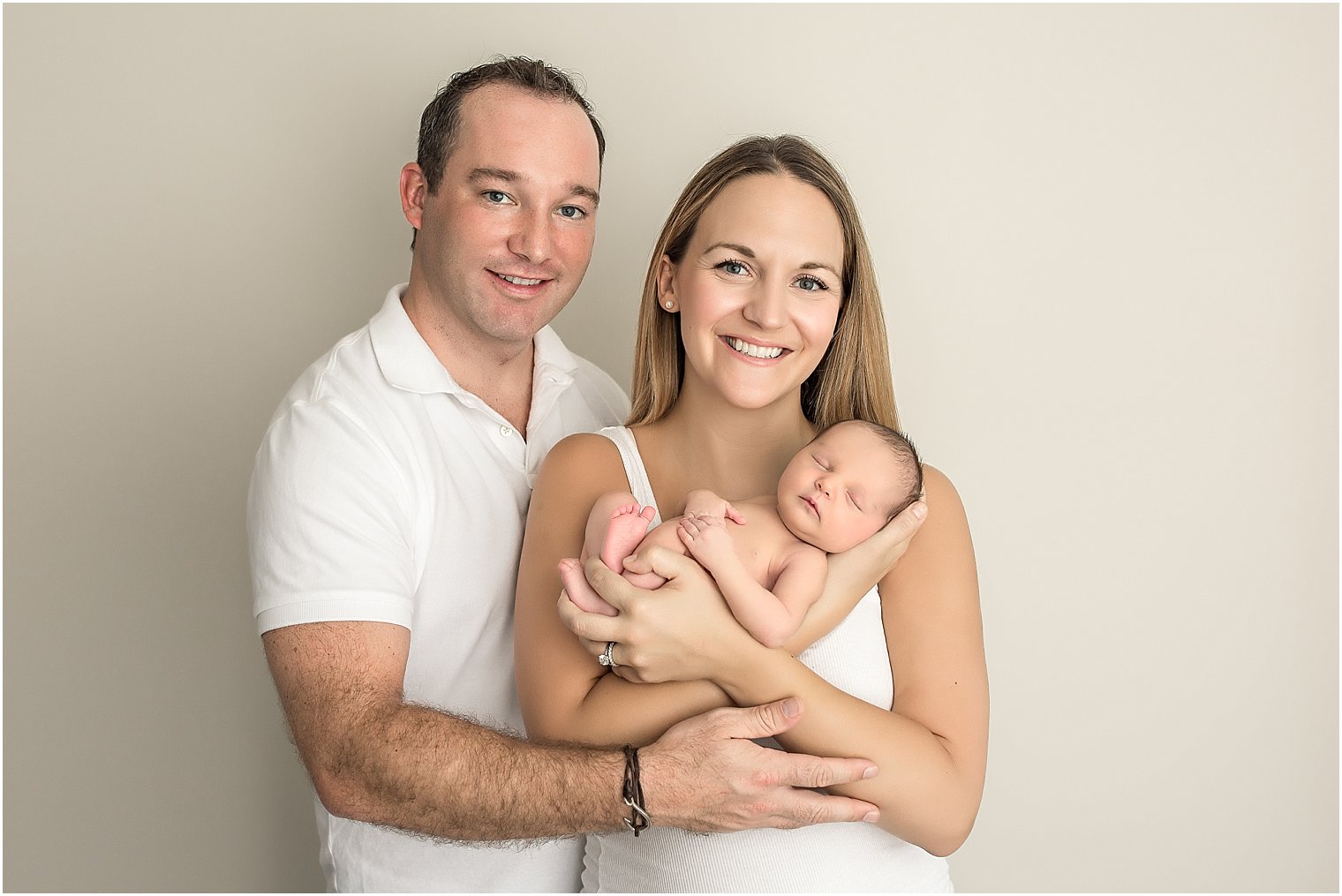 Baby girl with her parents