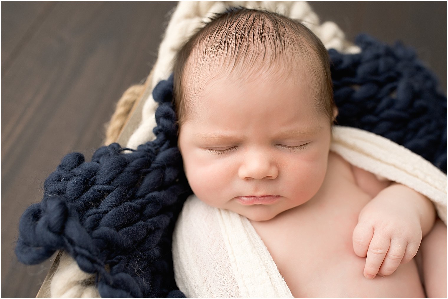 Sleepy newborn boy