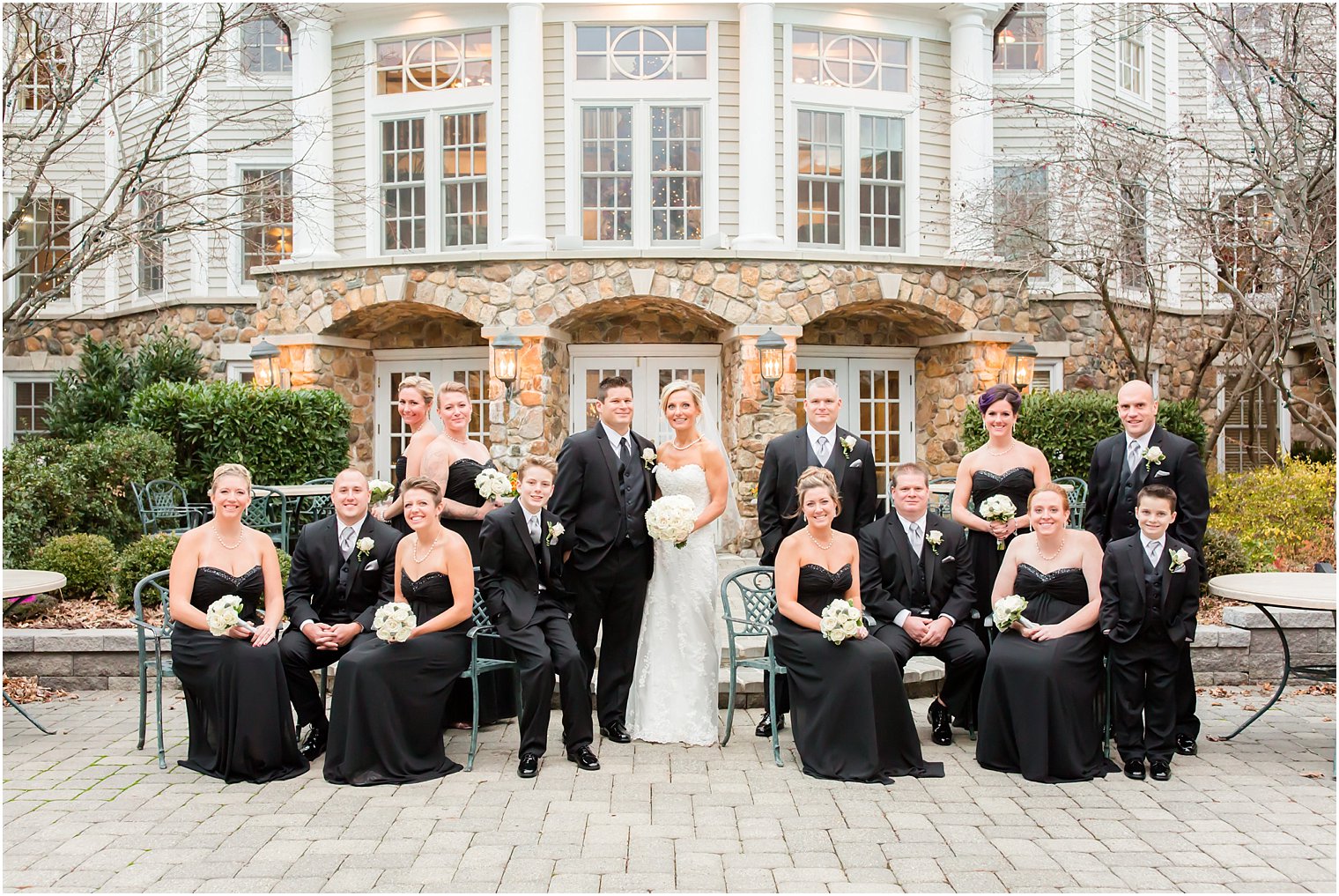 Classic winter wedding with black bridesmaids dresses