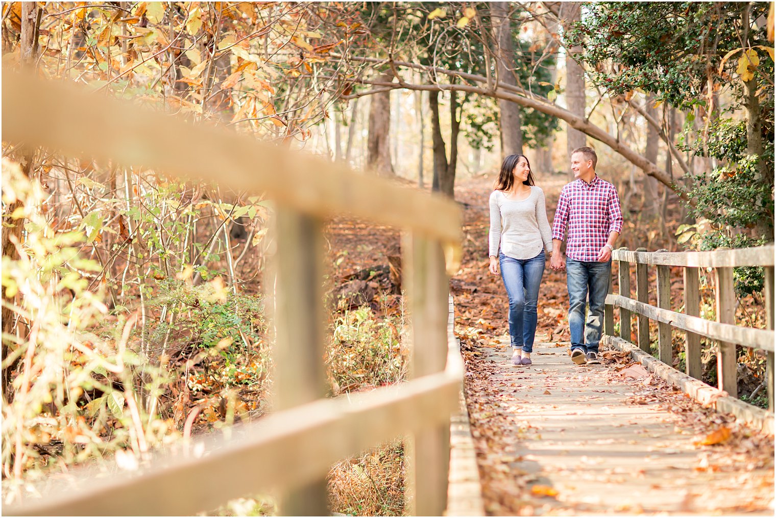 Couple walking on bridge