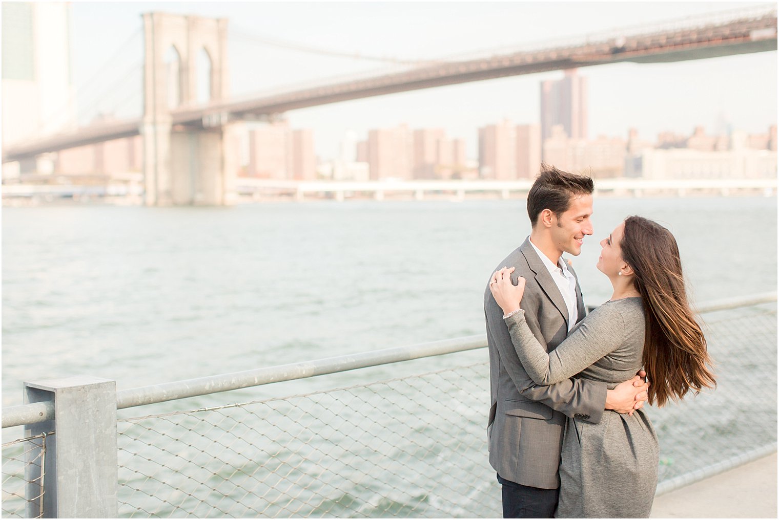 Windy engagement session in DUMBO