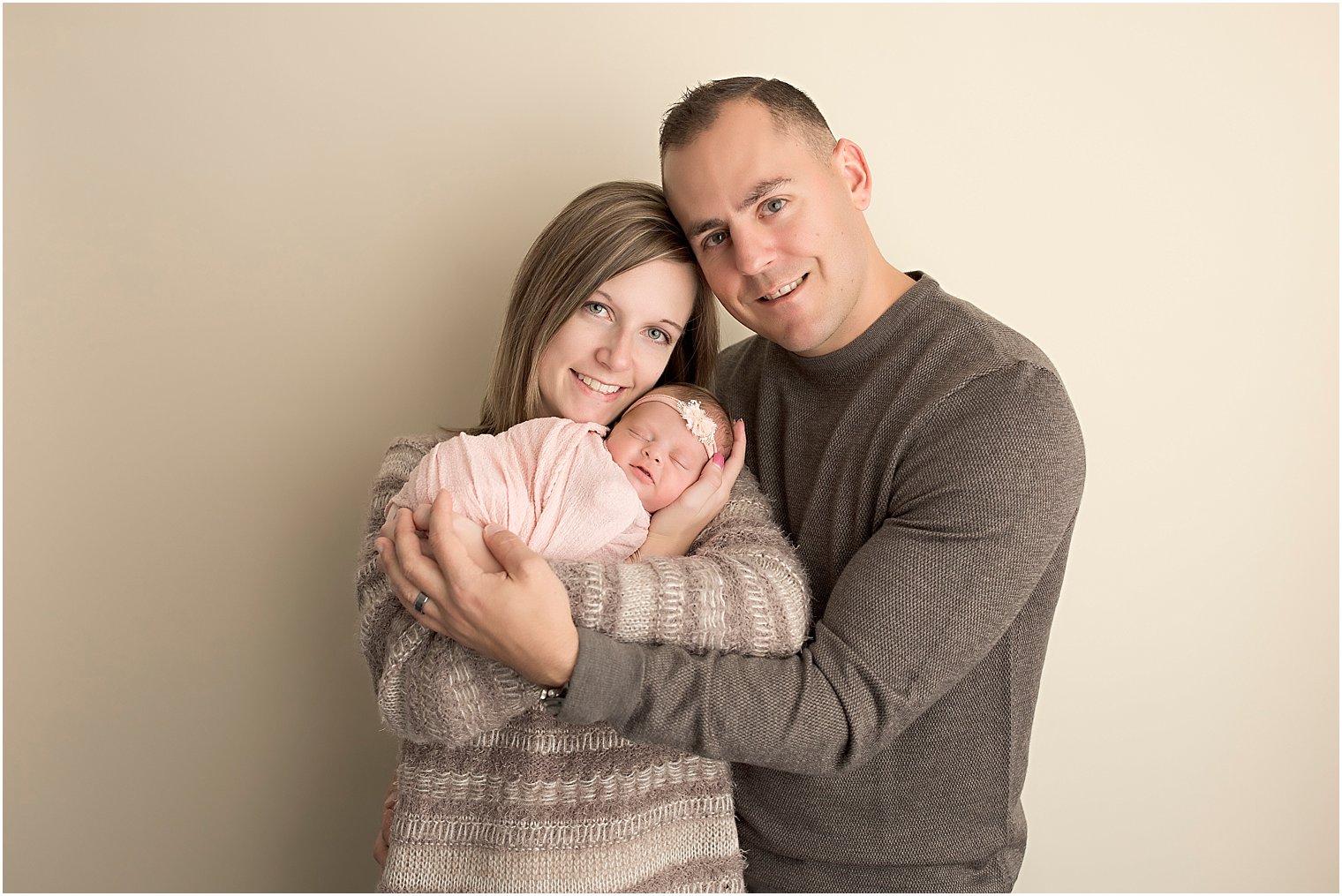 Newborn with proud parents