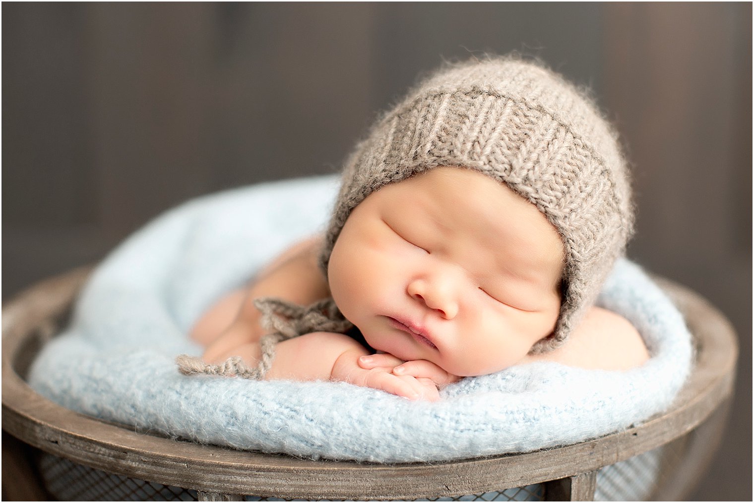 Baby boy in light blue and taupe