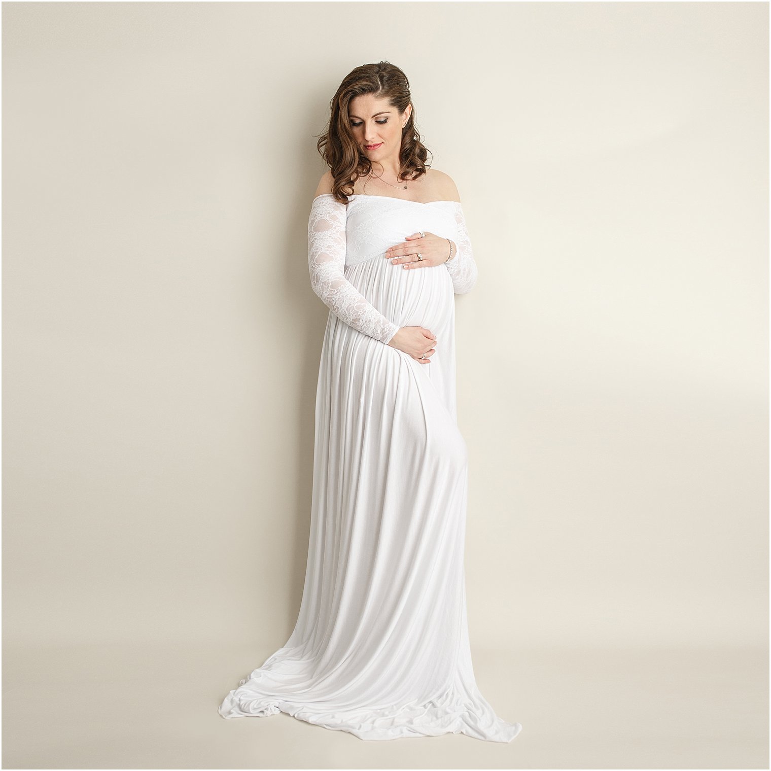 Expecting mother wearing maternity gown from Sew Trendy Accessories