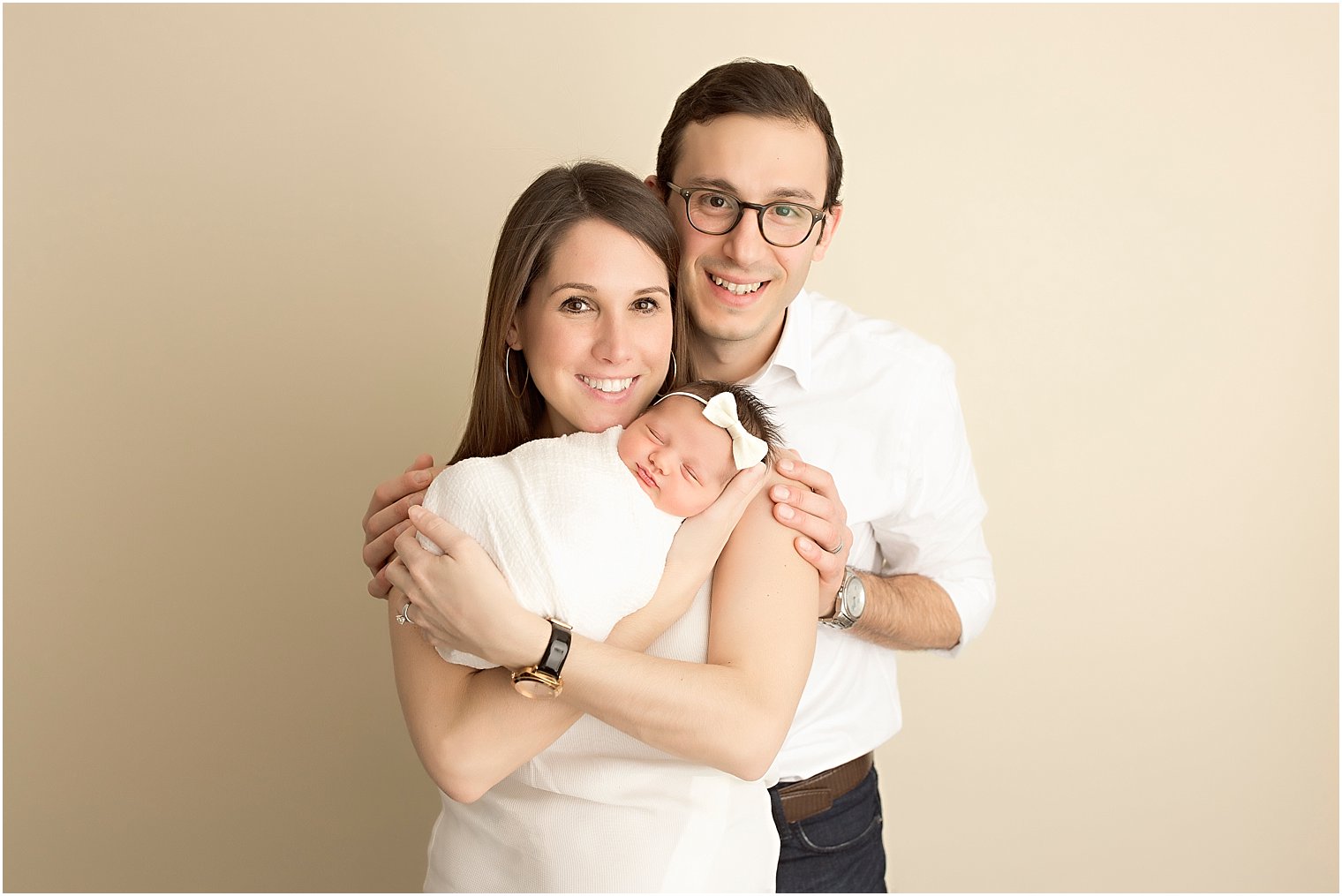Image of parents with newborn | Photos by Idalia Photography