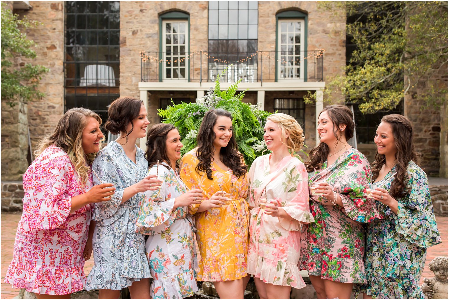 Bridesmaids in floral robes