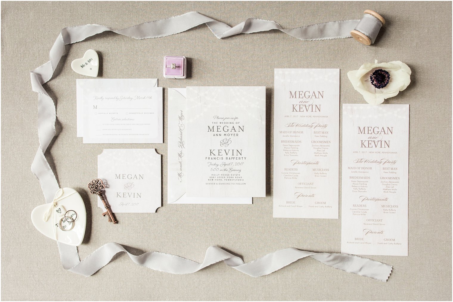 Full invitation suite with ribbon and floral elements