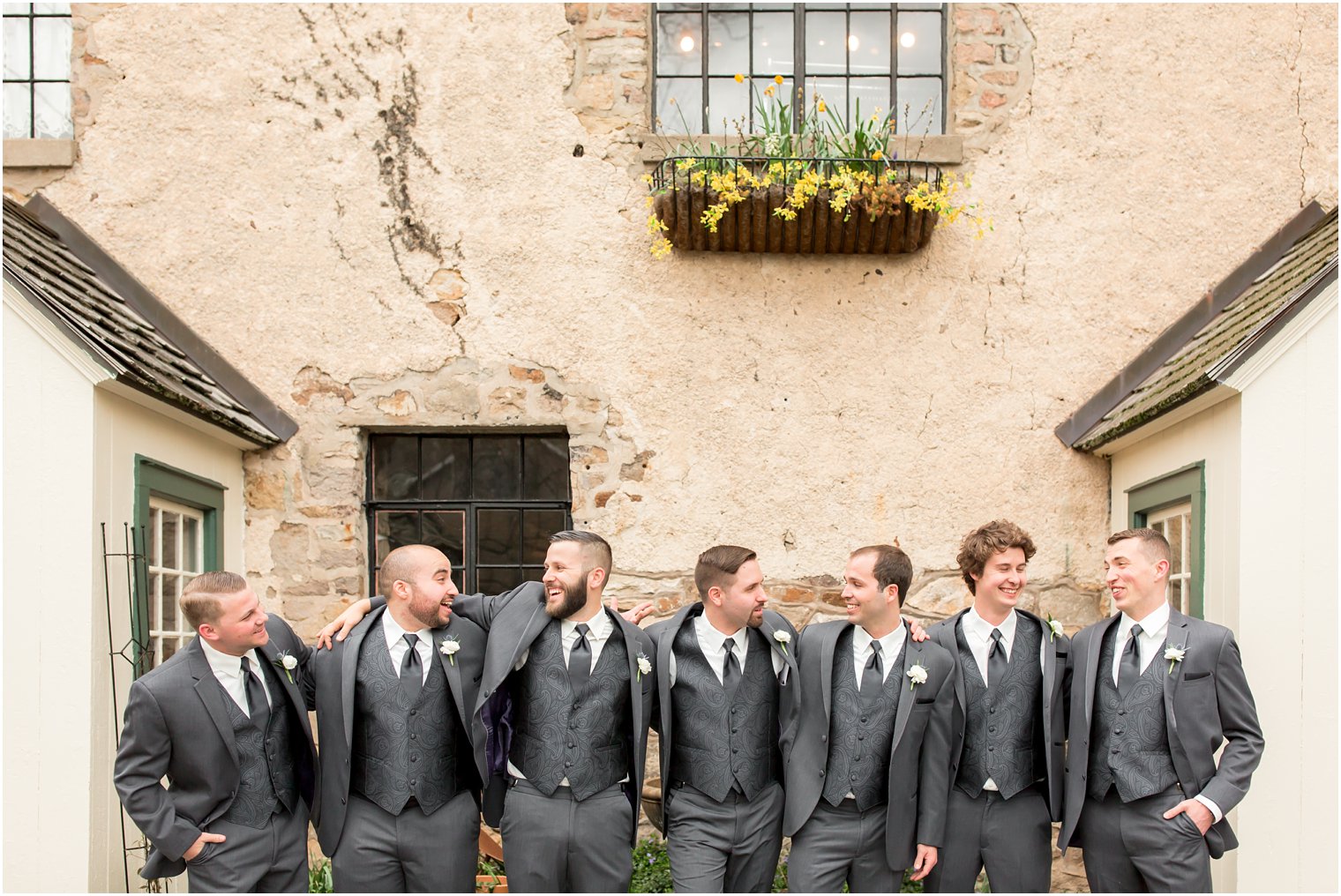 Groomsman wearing boutonnieres from Pod Shop Flowers in New Hope, PA | Photo by PA Wedding Photographers Idalia Photography