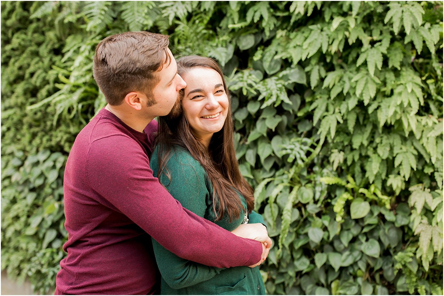 Candid moment in front of the Green Wall at Longwood | Photo by Idalia Photography