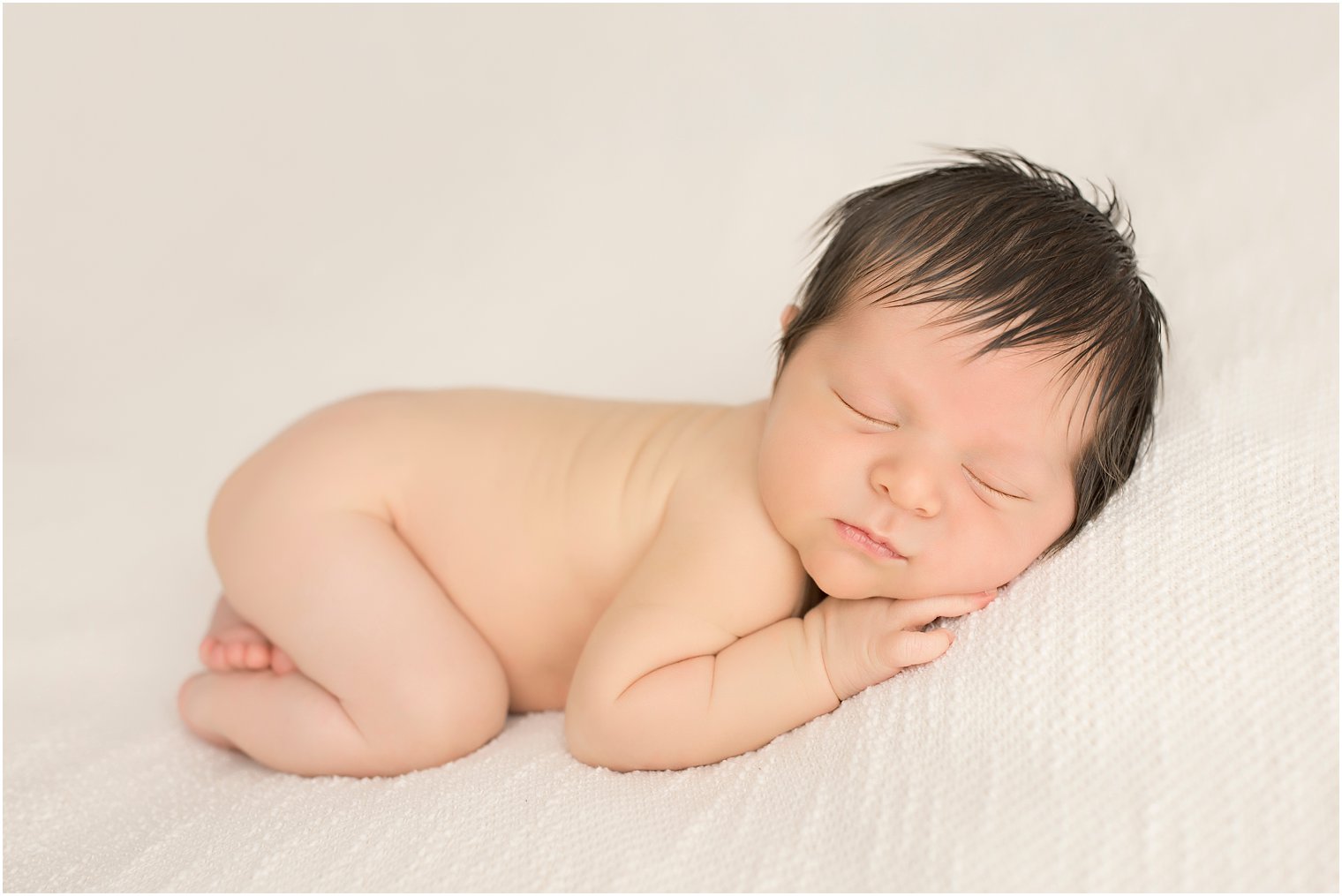 Newborn boy with lots of hair