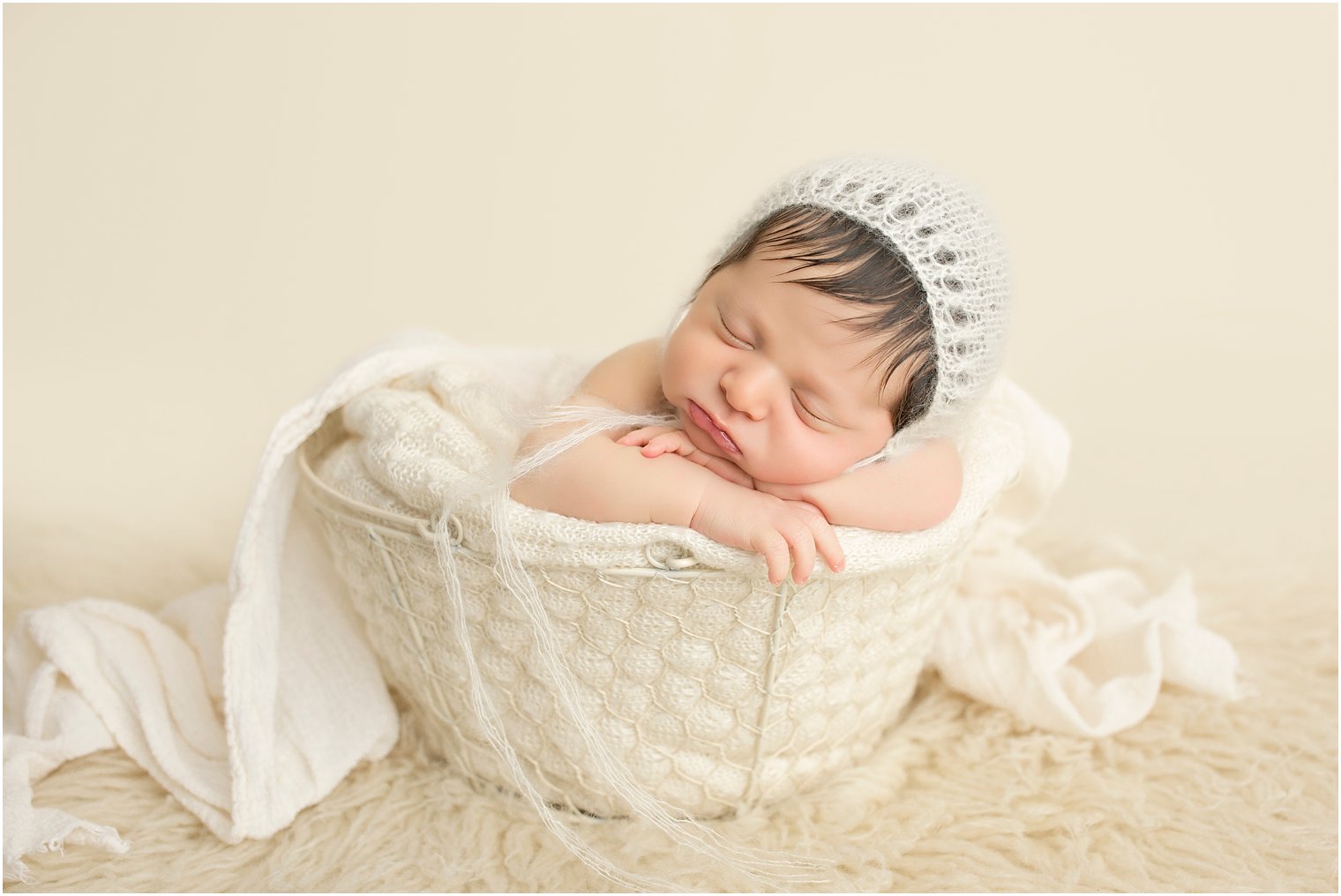 Newborn baby in a basket