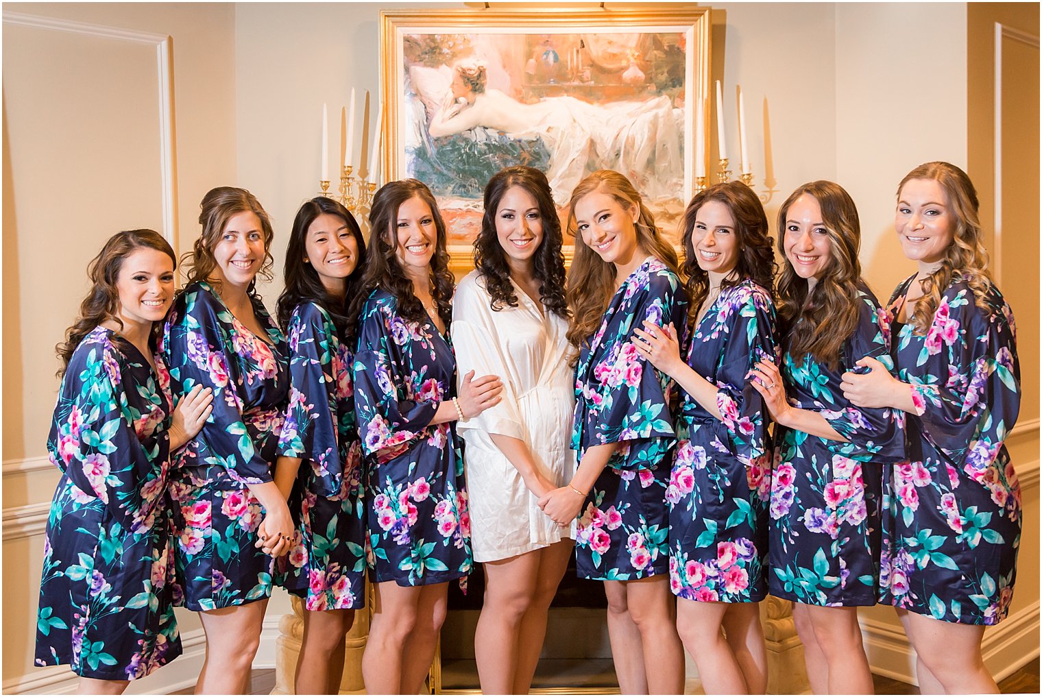 Bridesmaids in matching robes | Photo by Idalia Photography