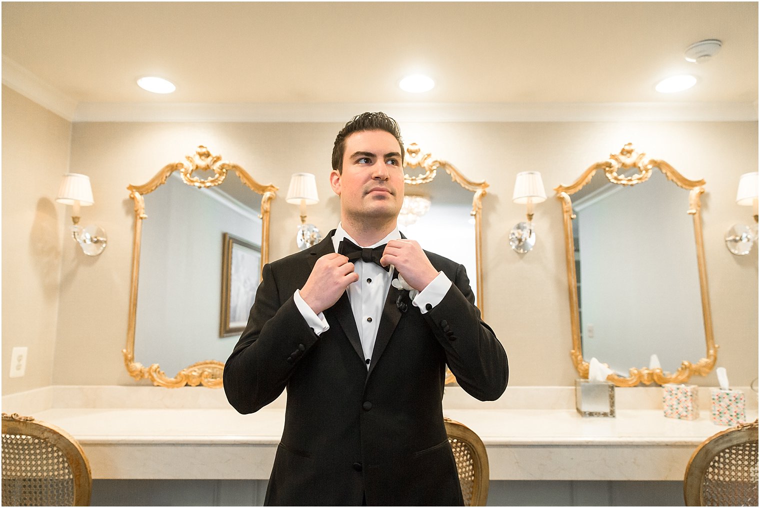 Classic groom in black tuxedo | Photo by Idalia Photography