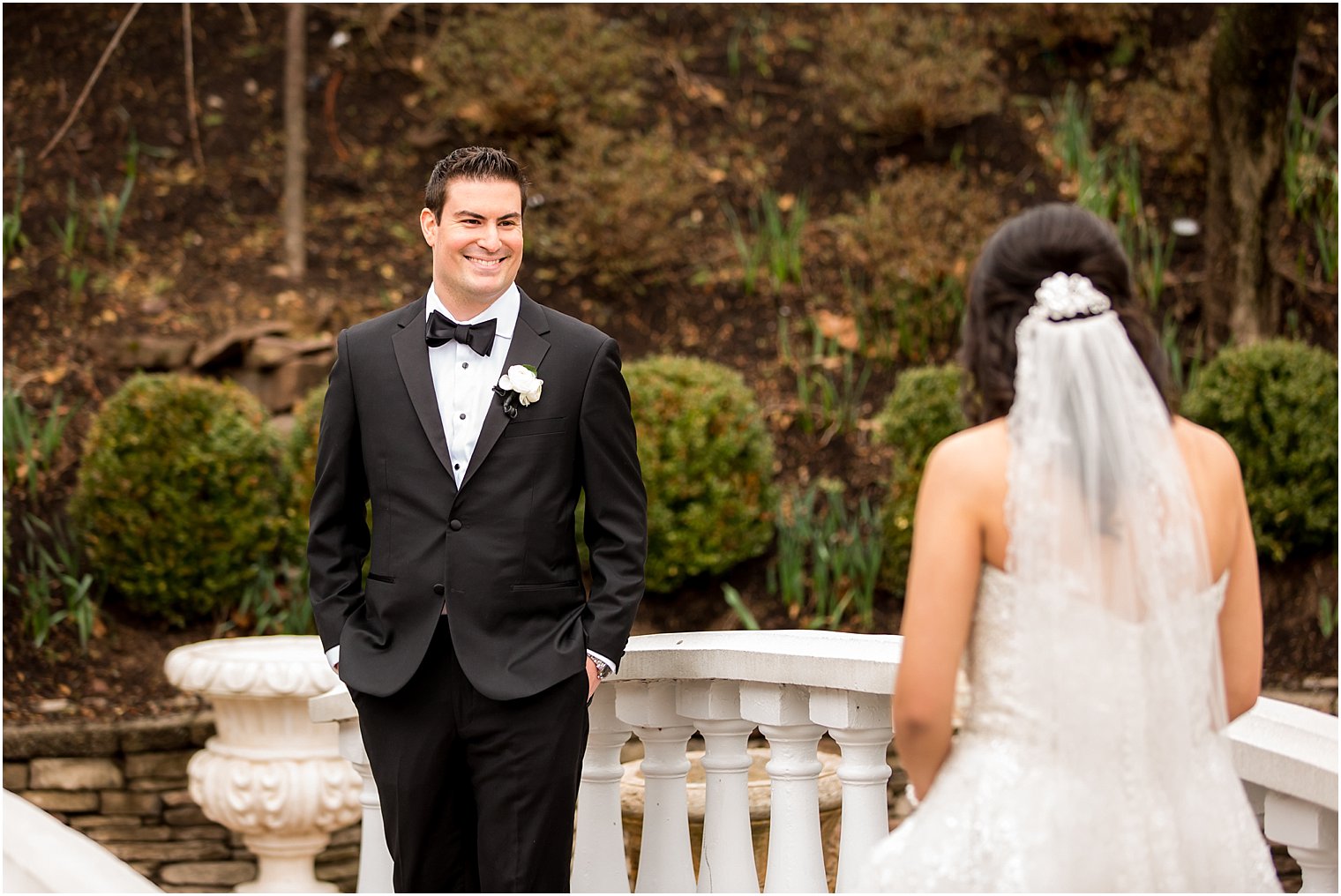 Groom's reaction at seeing his bride during first look | Photo by Idalia Photography
