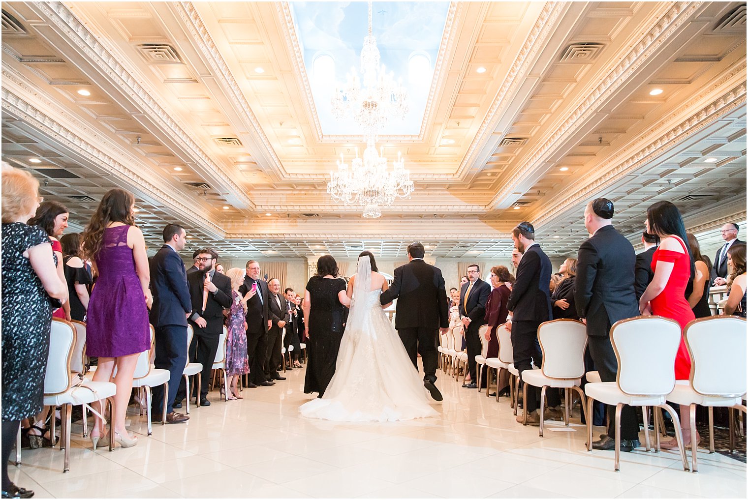 Bride walking down the aisle | Photo by Idalia Photography