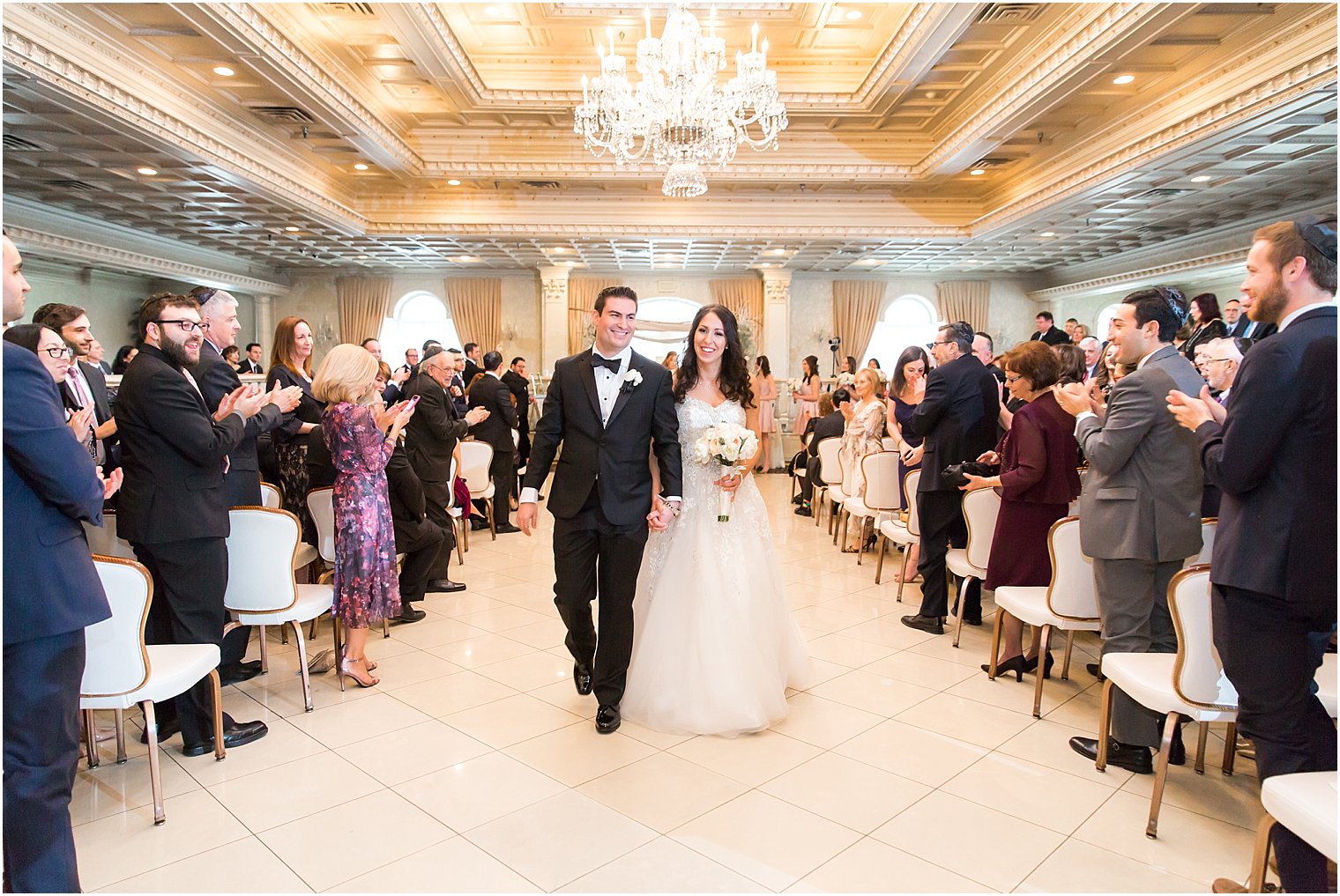 Bride and groom recessional | Photo by Idalia Photography