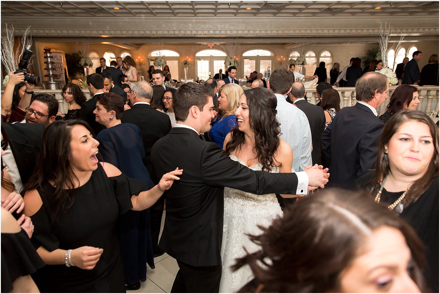 Reception dancing to Silver Arrow Band | Photo by Idalia Photography