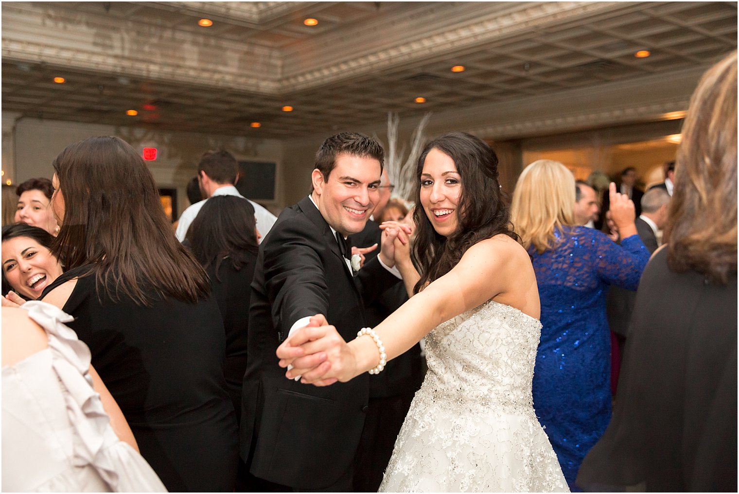 Reception dancing to Silver Arrow Band | Photo by Idalia Photography