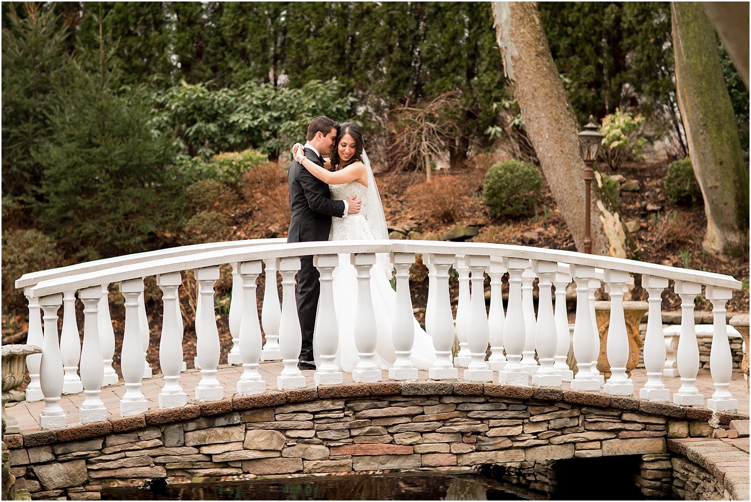 Bride and groom on bridge at Nanina's in Belleville NJ | Photo by Idalia Photography