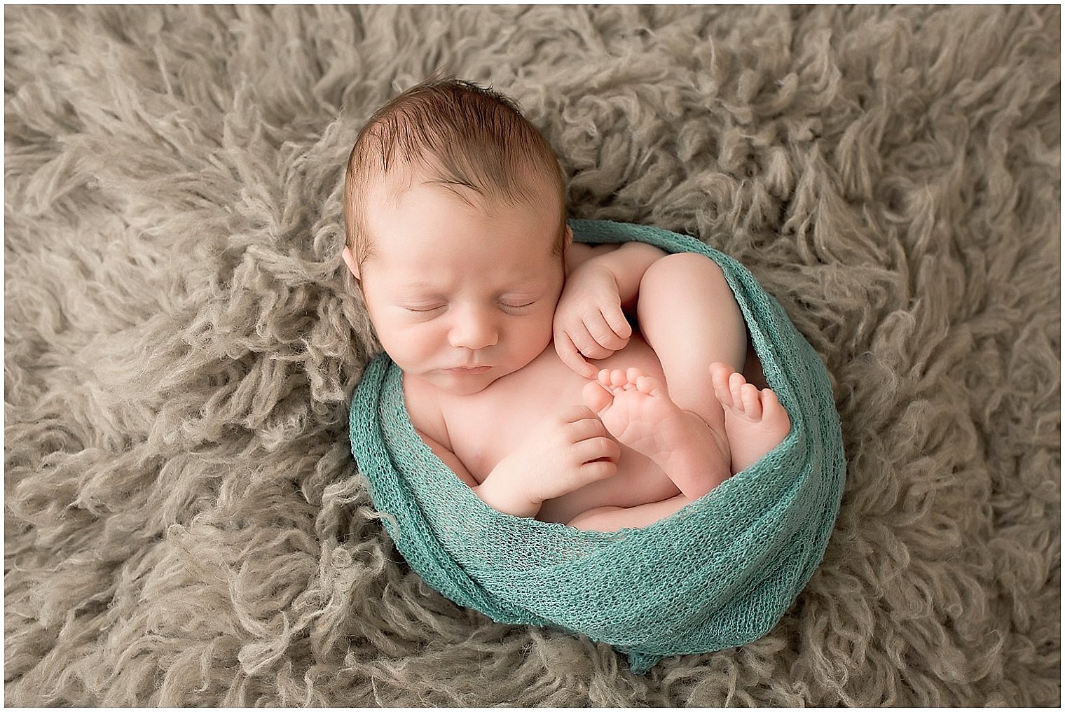Gray and turquoise newborn photo | Photo by Idalia Photography