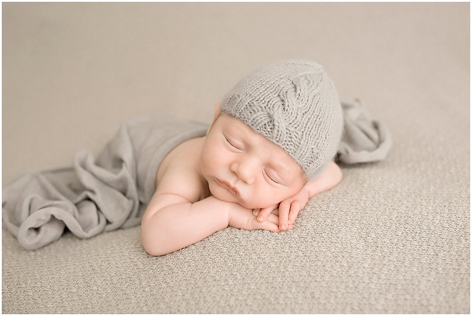 Sleepy newborn boy | Photo by Idalia Photography