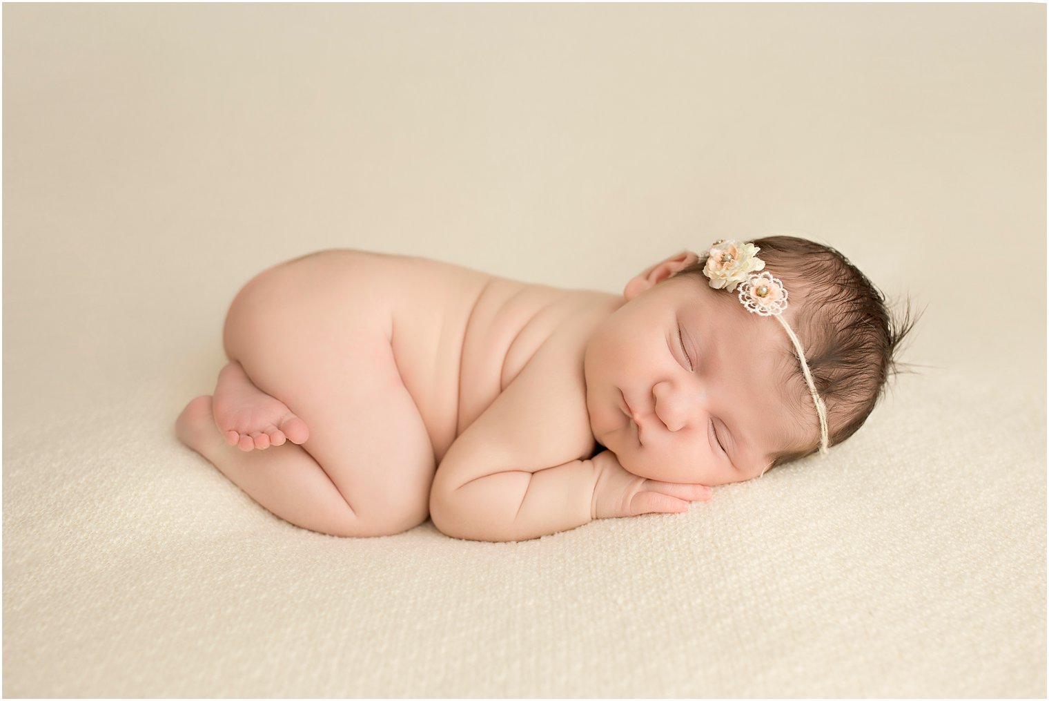 Newborn girl with headband