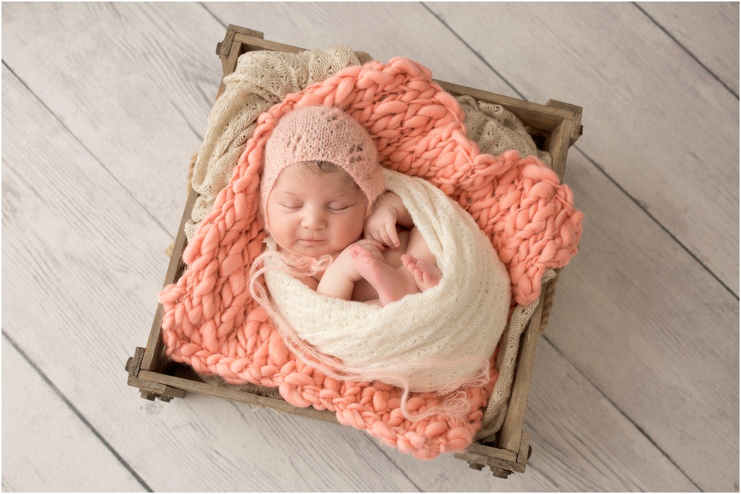 Newborn girl in a basket