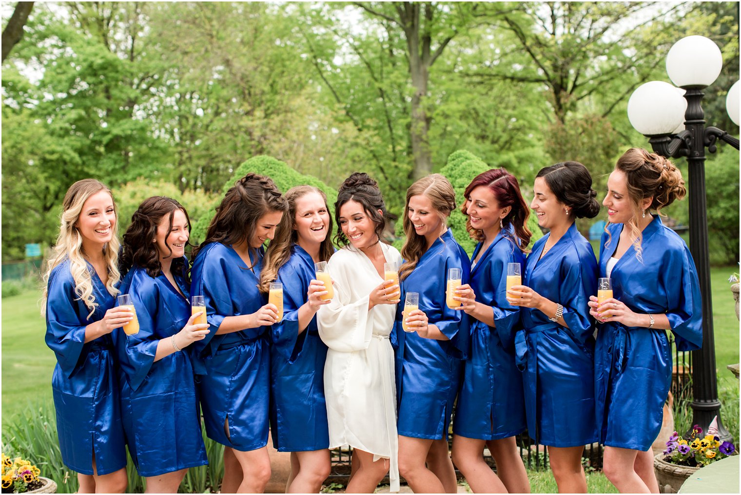 Bridesmaids in blue robes | Photos by Idalia Photography