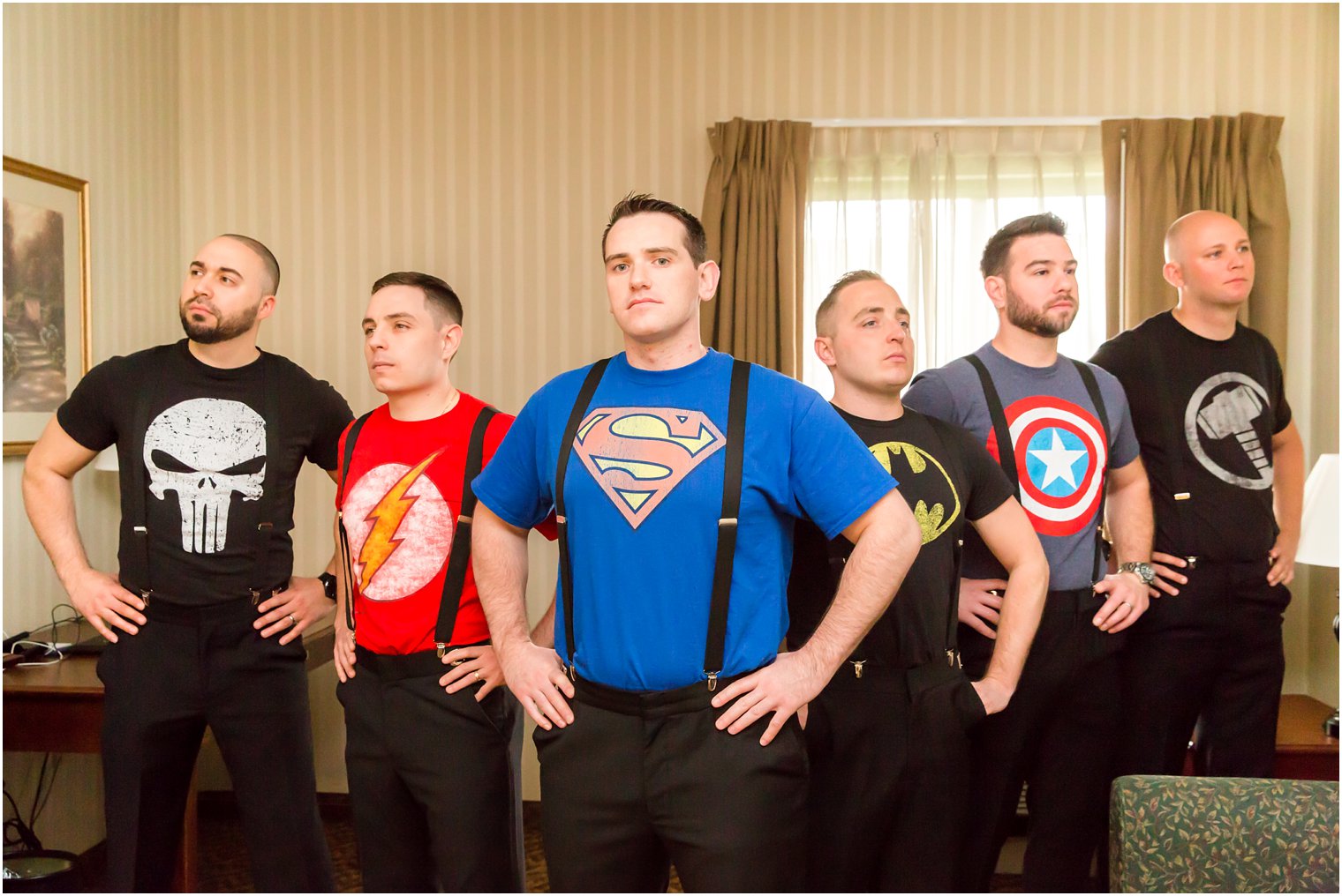 Groomsmen in superheros shirts