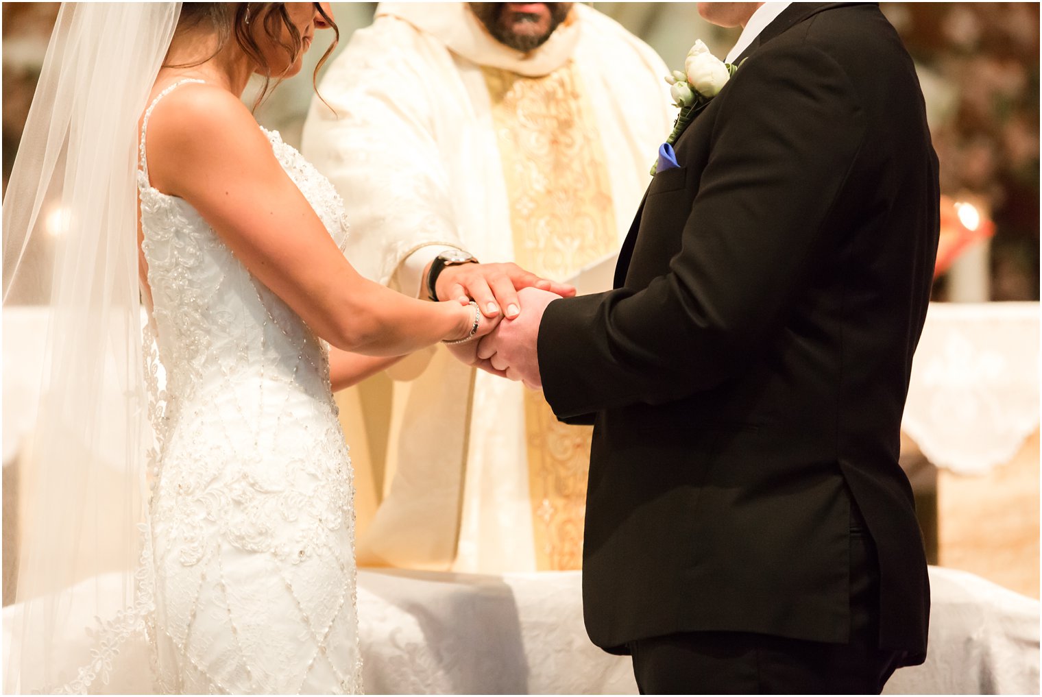 Bride and groom during traditional Catholic ceremony