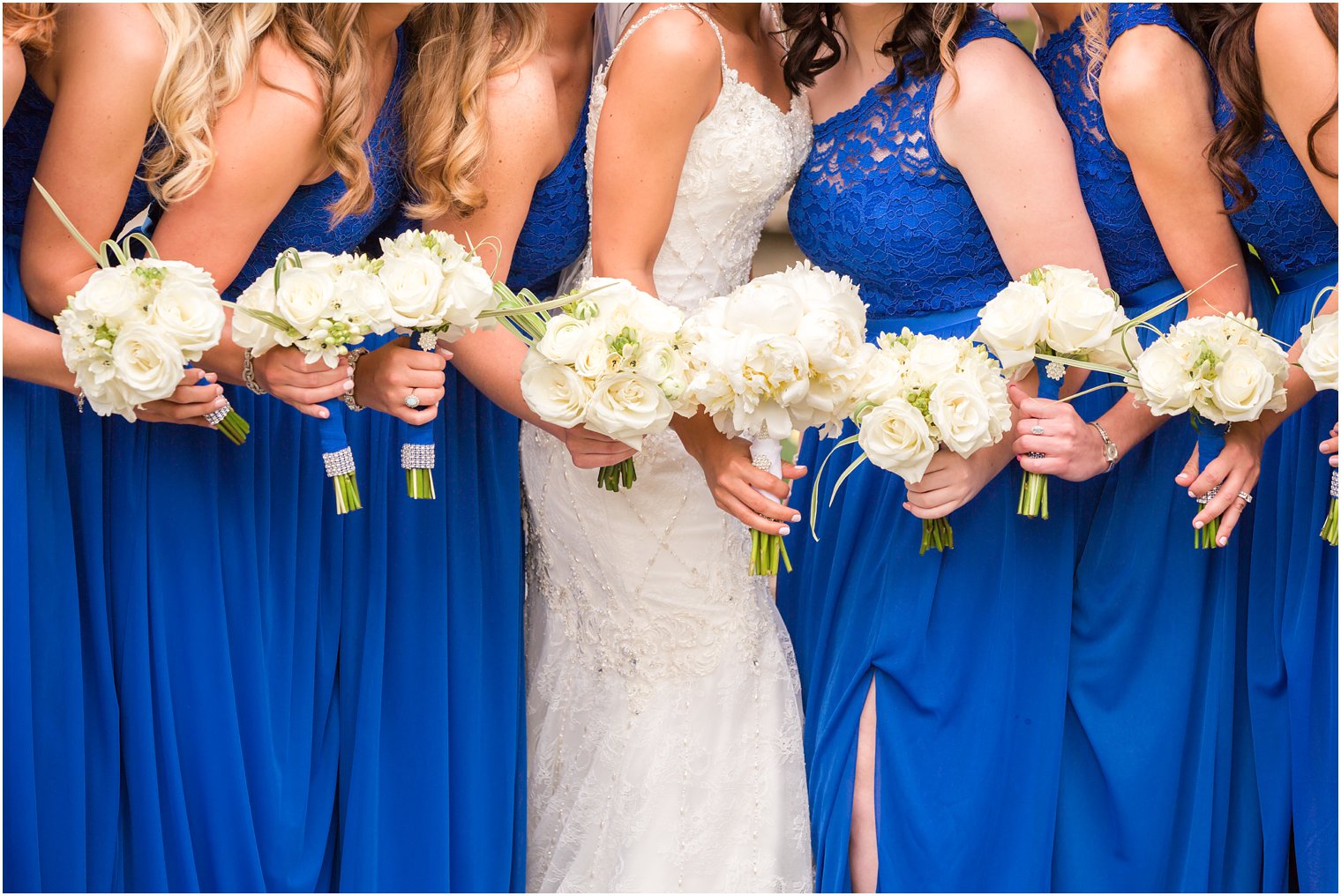 Bridesmaids with white florals