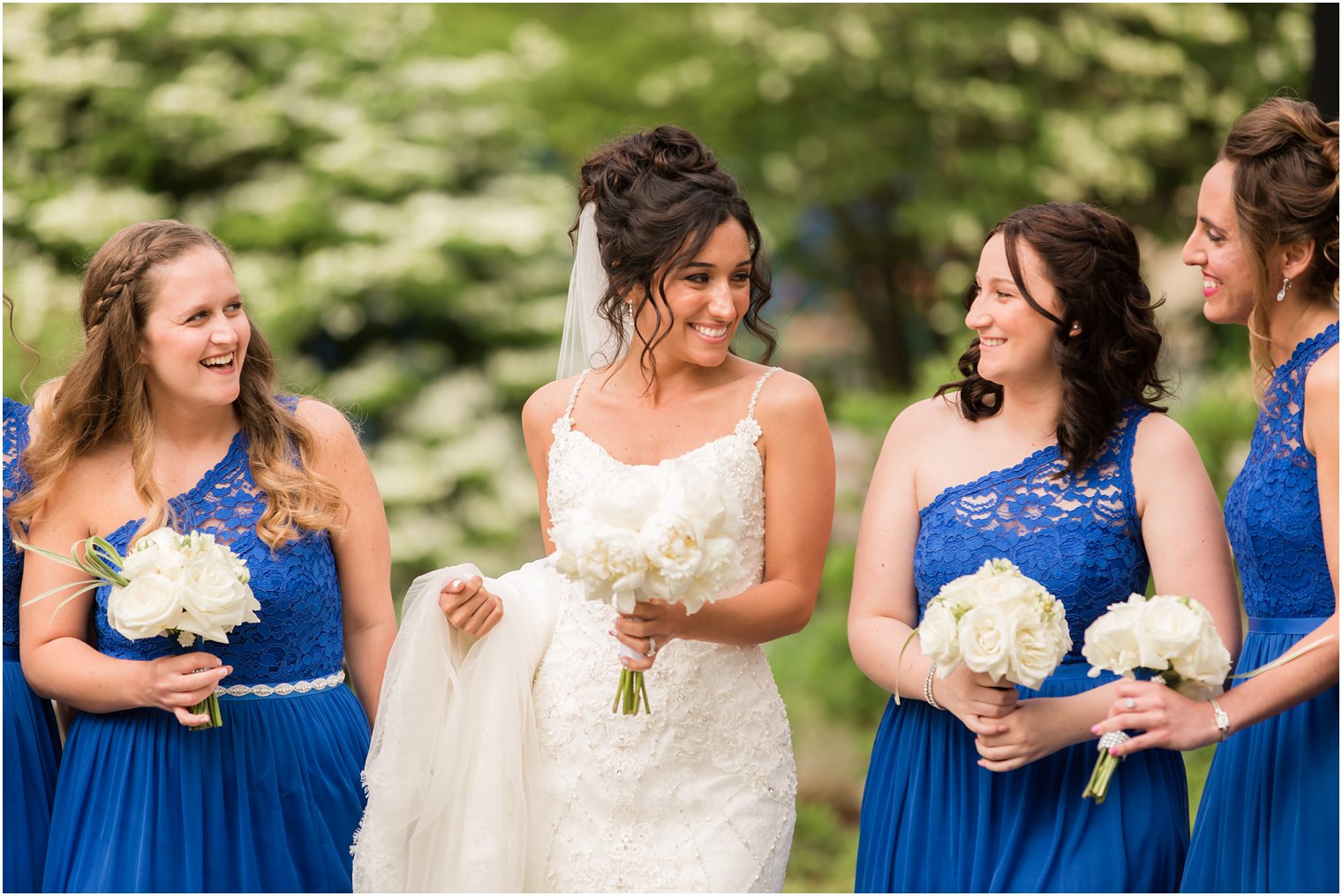 candid photo of bride and her bridesmaids