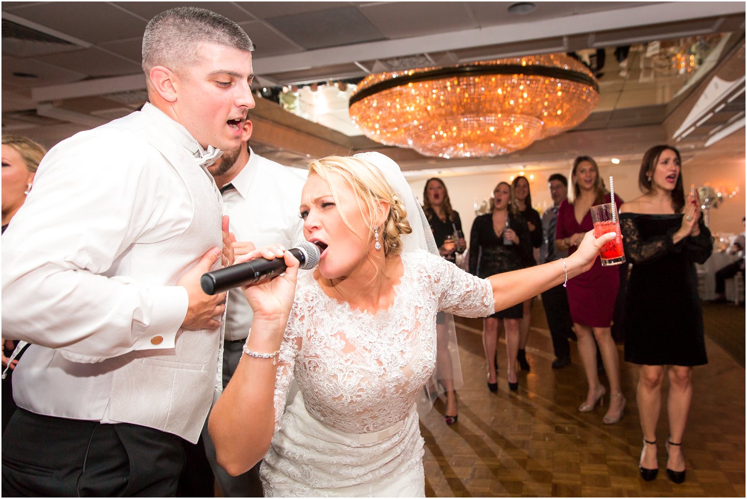 Fun reception photo at Doolan's Shore Club | Photo by Idalia Photography