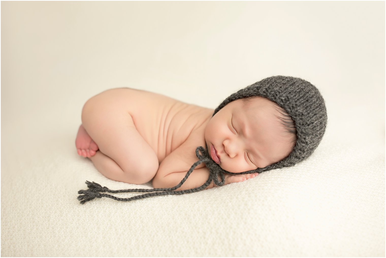 Newborn boy during Howell NJ Studio Newborn Session