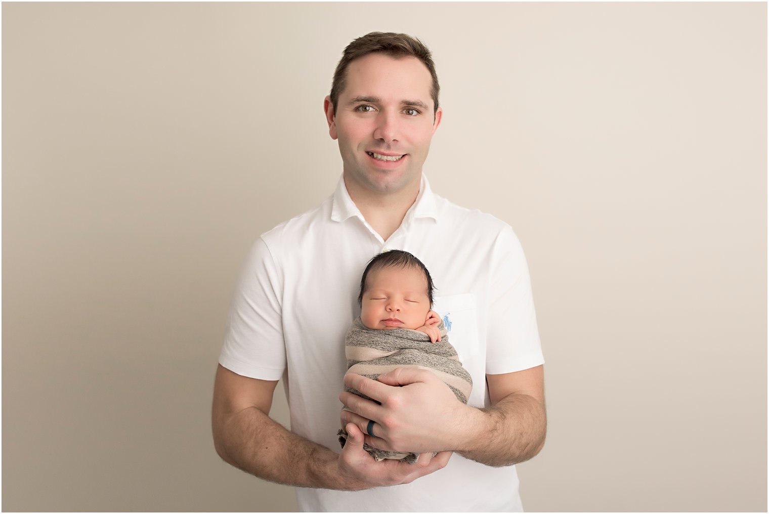 Father and newborn son photo