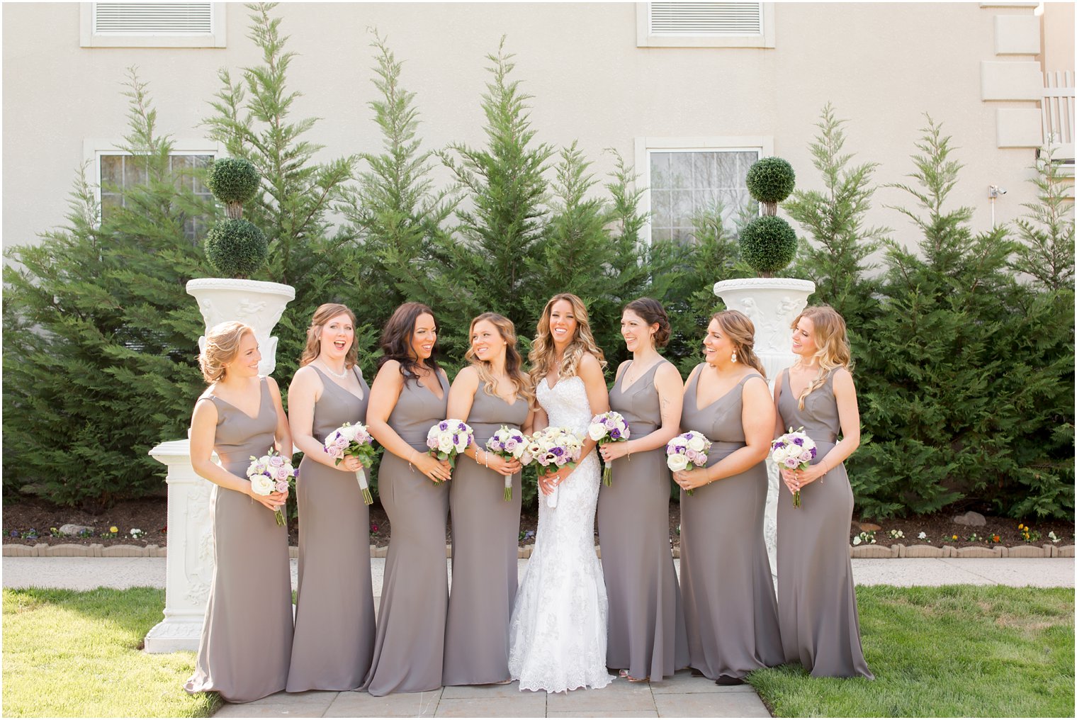 Bride and bridesmaids in gray dresses | Photos by Idalia Photography