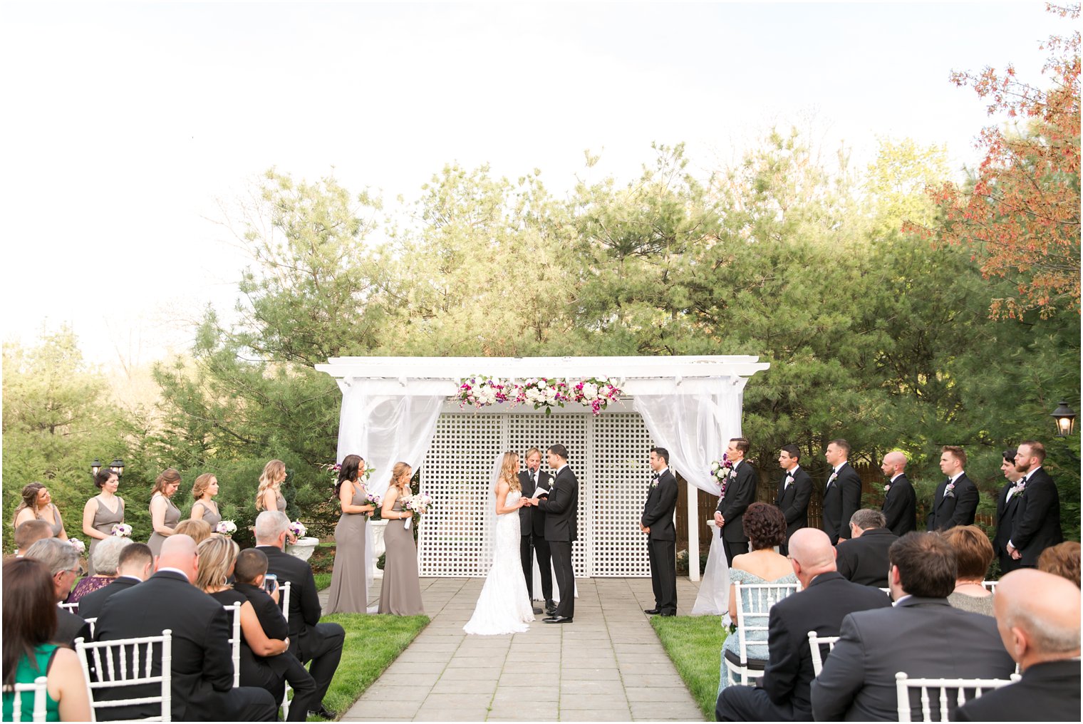 Exchanging vows on wedding day | Photos by Idalia Photography