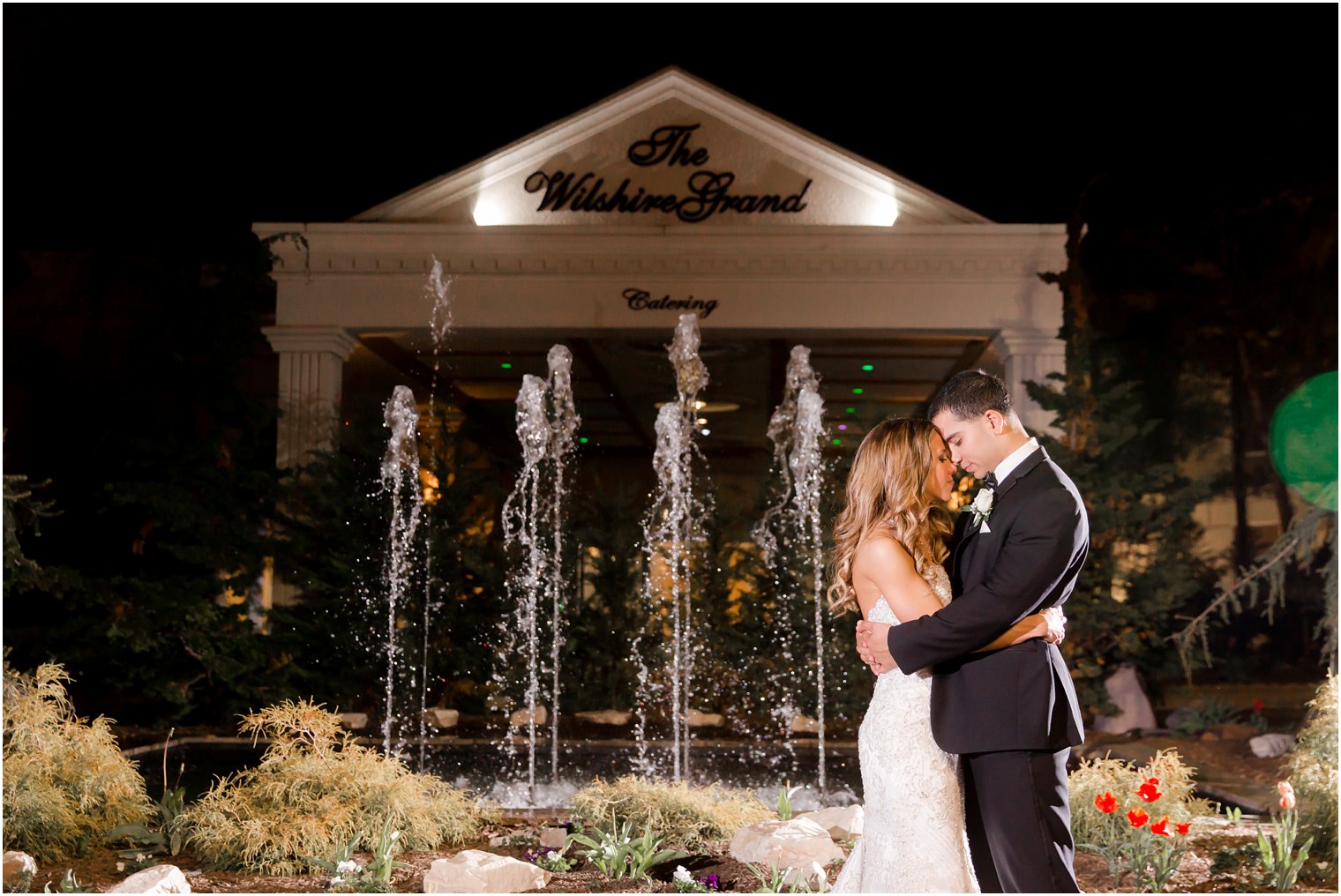 Night photo of bride and groom at Wilshire Grand Hotel | Photos by Idalia Photography