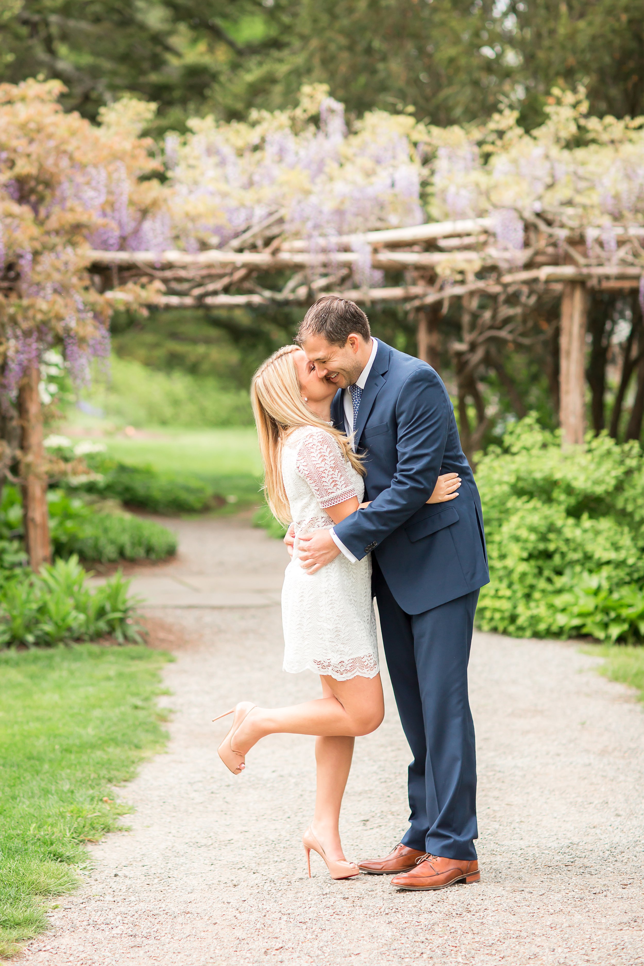 Laughing couple at engagement session | Photo by Idalia Photography