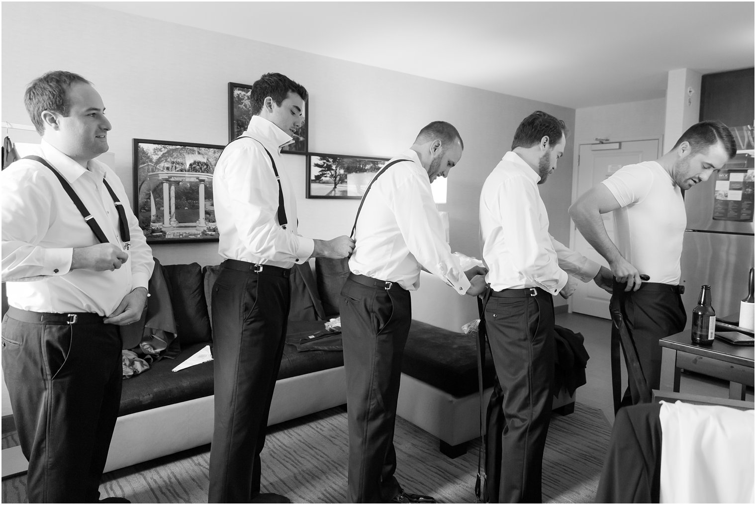 Cute groomsman getting ready photo idea | Photos by Idalia Photography